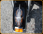 Master Pinstriper Casey Kennell striping Harley Davidson