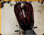 Casey Kennell pinstriping Suzuki Boulevard with Pinstriped Flames