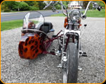 Casey Kennell painted these real flames on this nice Harley Davidson and Side Car