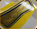 Casey Kennell painting and Lettering the 2019 Twisted Tea Bike. Cycle Source