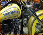 Casey Kennell painting and Lettering the 2019 Twisted Tea Bike. 