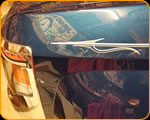 One of the Worlds Greatest Hand Lettering and Pinstripers Casey Kennell from the Paint Chop Striping a New Chrysler 300 