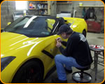 Best of the Best Pinstripers Casey Kennell pinstriping a new Corvette