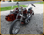 Master Custom Painter Casey Kennell painted these real flames on this nice Harley Davidson and Side Car