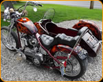 Master Custom Painter Casey Kennell painted these real flames on this nice Harley Davidson and Side Car