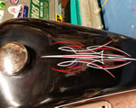 Casey Kennell pinstriped this Triumph