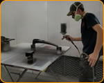 Casey Kennell painting the 2019 Twisted Tea Bike.