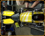 Casey Kennell painting and Lettering the 2019 Twisted Tea Bike. 