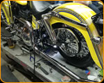 Casey Kennell painting and Lettering the 2019 Twisted Tea Bike. Cycle Source