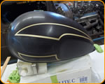 Custom Professional Pinstriping on this Tiumph fuel Tank